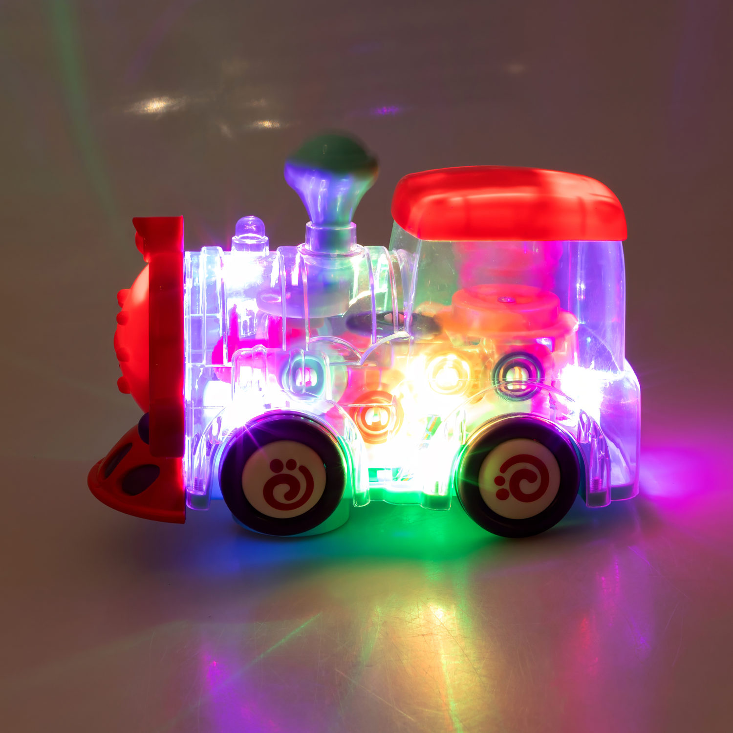 Игрушка прозрачная с шестеренками 1TOY Движок «Локомитив», со светом и звуком, 1 шт.