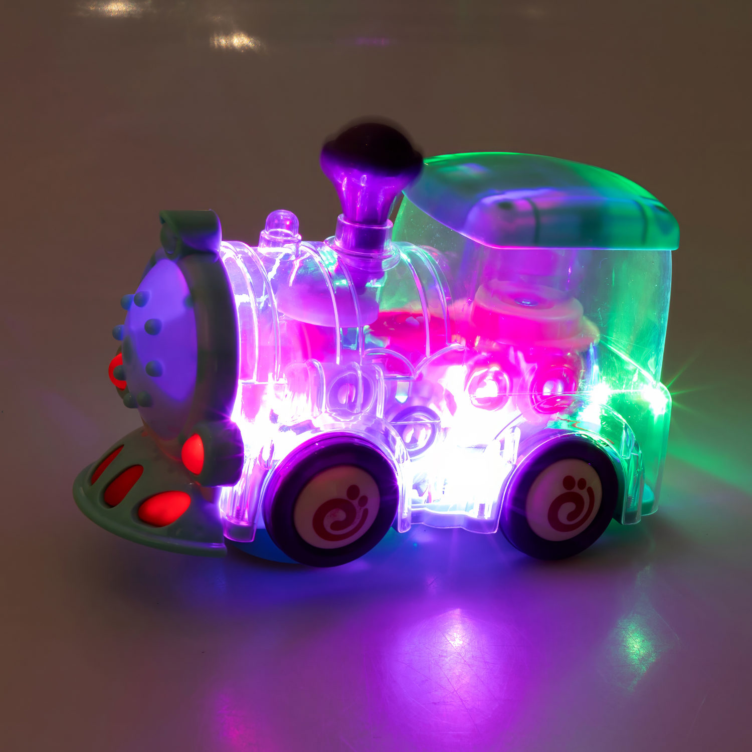 Игрушка прозрачная с шестеренками 1TOY Движок «Локомитив», со светом и звуком, 1 шт.