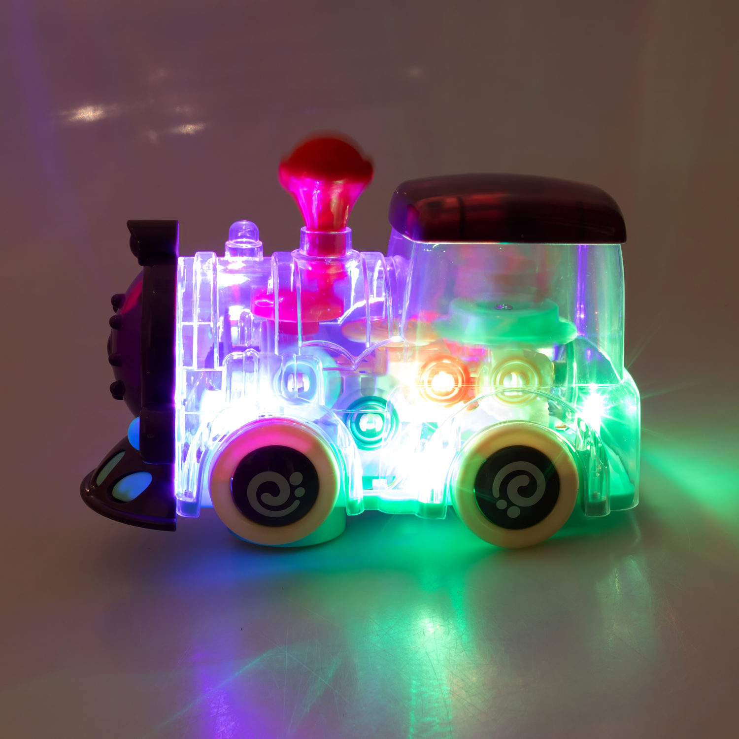 Игрушка прозрачная с шестеренками 1TOY Движок «Локомитив», со светом и звуком, 1 шт.